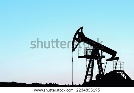 Crude oil Pumpjack. Fossil crude output and fuels oil production. Oil drill rig and drilling derrick. Global crude oil Prices, energy, petroleum demand (OPEC+). Pump jack at oilfield.