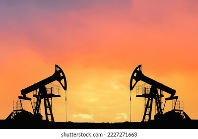 Crude oil Pumpjack on sunset. Fossil crude output and fuels oil production. Oil drill rig and drilling derrick. Global crude oil Prices, energy, petroleum demand (OPEC+). Pump jack at oilfield.