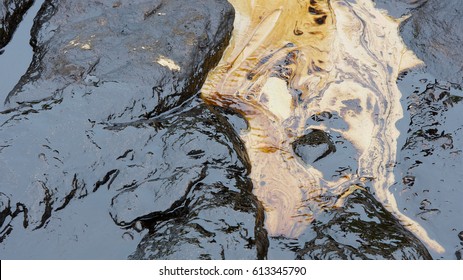 Crude Oil Spill On The Stone At The Beach In HD Ratio, 16x9