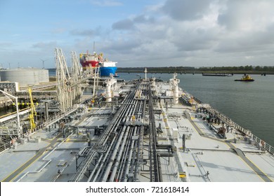 Crude Oil Tanker Discharging To The Terminal.