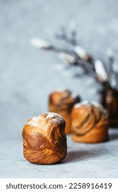 Cruffin buns on sprinkled with powdered sugar. Easter baking.Vegan croissant muffin. The sourdough-enriched dough. Healthy and organic food. top view. High quality photo - Shutterstock ID 2258916419