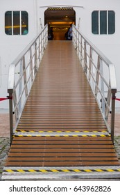 Cruise Boarding Entrance Platform In Sea Port. Vertical Close Up View