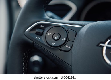 Cruise control unit on the steering wheel of an Opel car