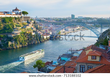 Cruise ship arrives to Porto by the river Douro. Portugal