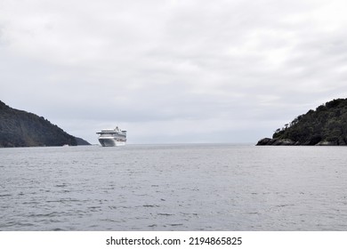 Cruise Ship Entering Milford Sound From The Tasman Sea. 