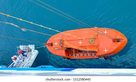 Cruise Ship Lifeboat Lifted Back To Ship At The End Of A Softy Drill At Sea.