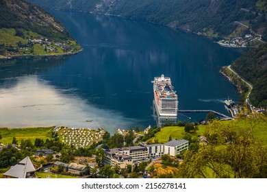 Cruise Ship, Cruise Liners On Geiranger fjord, Norway. The fjord is one of Norway's most visited tourist sites. Geiranger Fjord, a UNESCO World Heritage Site
