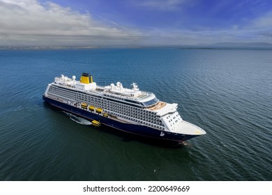 Cruise Ship In The Ocean, Passengers Loading N Shuttle Ferry. Blue Cloudy Sky. Tourism And Travel Concept. Elegant Voyage By Water. Aerial View. Calm Water Surface. Calm And Peaceful Mood.