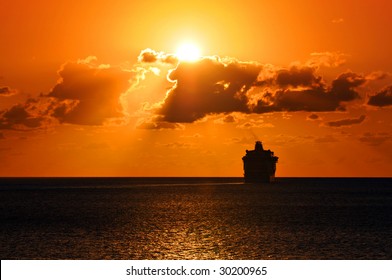 Cruise Ship Sailing Into The Sunset