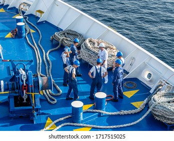 Cruise Ship Workers Prepare For Mooring In Port Of Piraeus. September 2016.