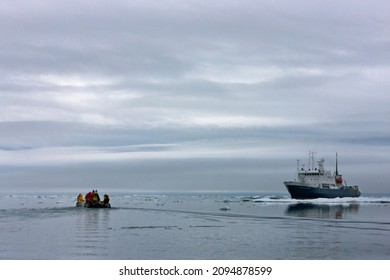 Cruise Ship And Zodiac In Chukchi Sea, Russia Far East