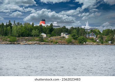 Cruise ships Cunard Queen Victoria navigate the Stockholm Archipelago, Sweden, Stockholm, Sailing Yacht Stockholm Archipelago - 25th of July 2011 - Powered by Shutterstock