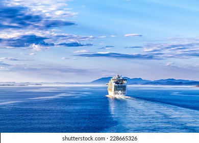 The Cruise White Liner Sailing On The Sea