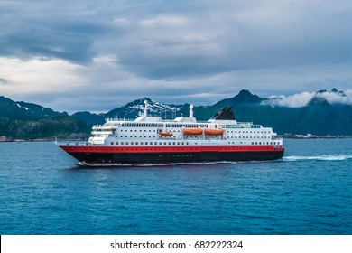 Cruiseship leaving the Svolvaer harbor, Lofoten Islands, an archipelago and a traditional district in the county of Nordland, Norway. Located north of the Arctic Circle. 