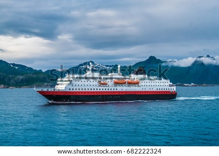 Cruiseship leaving the Svolvaer harbor, Lofoten Islands, an archipelago and a traditional district in the county of Nordland, Norway. Located north of the Arctic Circle. 