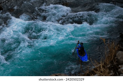 
Cruising with canoe, White water rafting on the rapids of river Yoshino on January 2024 in OBOKE Canyon, Japan. Yoshino River is one of the most popular among rafters in Japan.