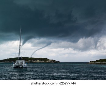 Cruising Catamaran Anchored During Storm, In The Great Abaco, Bahamas.