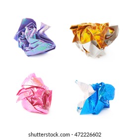 Crumbled ball of colorful origami paper sheet isolated over the white background, set of four different foreshortenings
