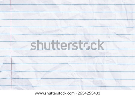 Crumbled lined loose leaf notebook paper background for school, education, journaling, or writing themes