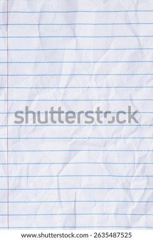 Crumbled lined loose leaf notebook paper background for school, education, journaling, or writing themes