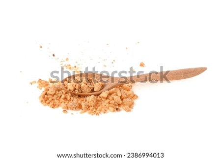 Crumbled Peanuts , Broken Roasted Arachis Nuts, Heap of Pea Nut Crumbs, Whole Groundnut Pieces, fried peanuts, Peanut Fractions in wooden spoon isolated on White Background