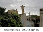 The crumbling headstone and overgrown graves of Valparaiso´s Panteon Hill Cemetery tell a story of neglect and forgetfulness