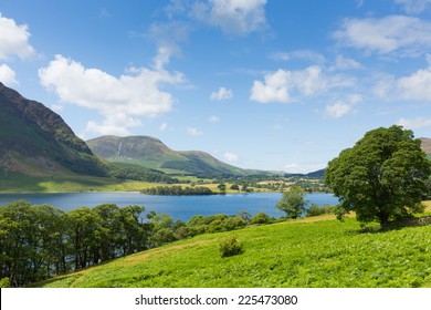 Crummock Water Lake District Cumbria England UK Between Buttermere And Loweswater On Summer Day With Blue Sky And White Clouds