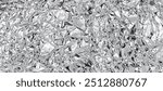 Crumpled aluminum foil background. realistic texture 