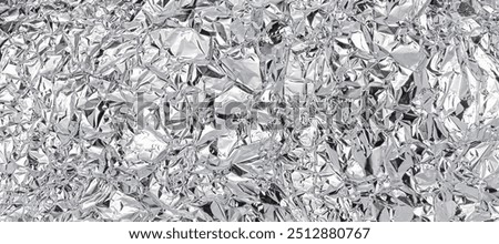 Crumpled aluminum foil background. realistic texture 