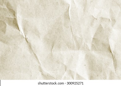 crumpled beige paper background texture