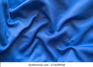 Crumpled Blue Synthetic Fabric. Abstract Empty Background. Top View.