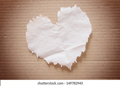 Crumpled Brown  Tissue Paper (heart Shape) On Cardboard