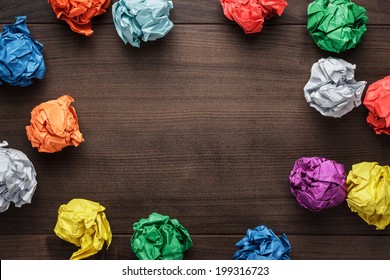 Crumpled Colorful Paper On Wooden Background Creative Process