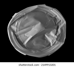 Crumpled Disposable White Plastic Plate Isolated On Black