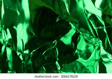 Crumpled Green Foil Paper Texture.