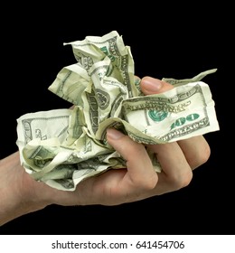 crumpled money hundred dollars bills man hand black background