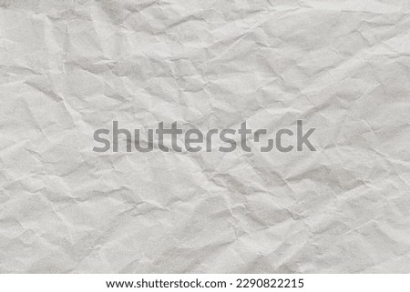 Crumpled old brown cardboard paper texture background