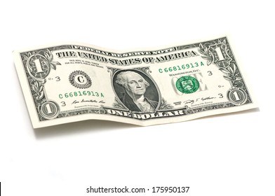 crumpled one dollar on a white background