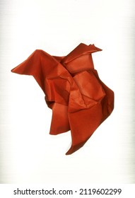 Crumpled Orange Red Paper Ball