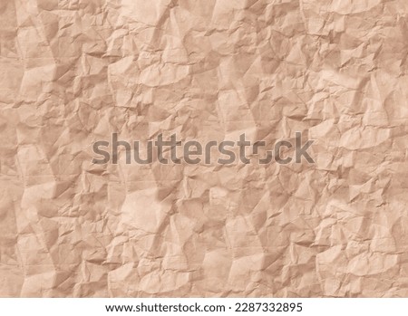 Crumpled paper background, wrinkled kraft backdrop, texture.
