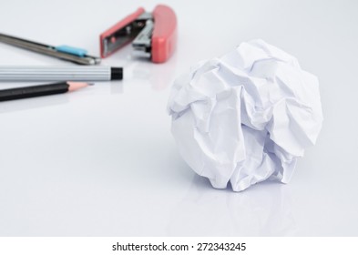 Crumpled Paper Ball On Desk