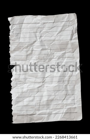 Crumpled paper on black background. Wrinkled notebook page with copy space.