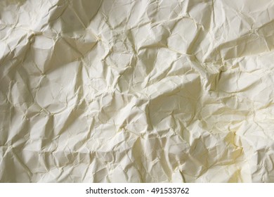 Crumpled paper texture pattern background in light white color tone