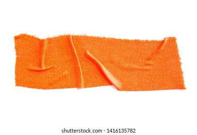 Crumpled Piece Of Orange Matte Cloth Gaffer Tape Isolated On White Background.