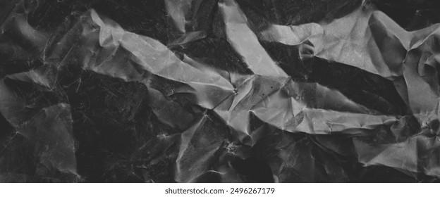 crumpled plastic texture with polygon-like pattern. abstract gray plastic background