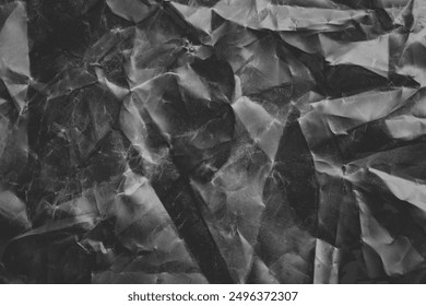 crumpled plastic texture with polygon-like pattern. abstract gray plastic background