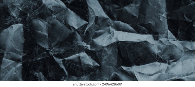 crumpled plastic texture with polygon-like pattern. abstract gray plastic background