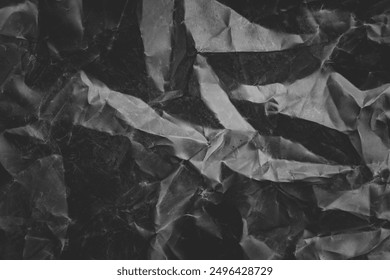 crumpled plastic texture with polygon-like pattern. abstract gray plastic background