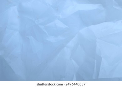 crumpled plastic texture with polygon-like pattern. abstract transparent white plastic background