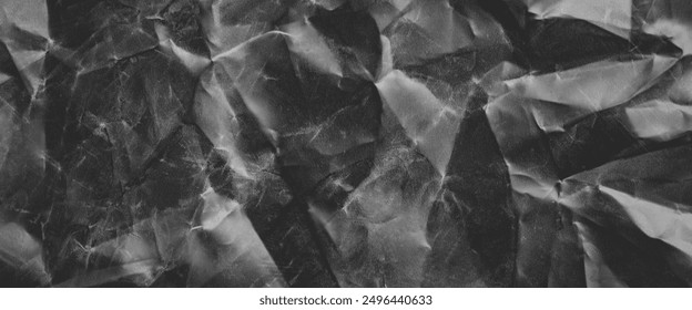 crumpled plastic texture with polygon-like pattern. abstract gray plastic background